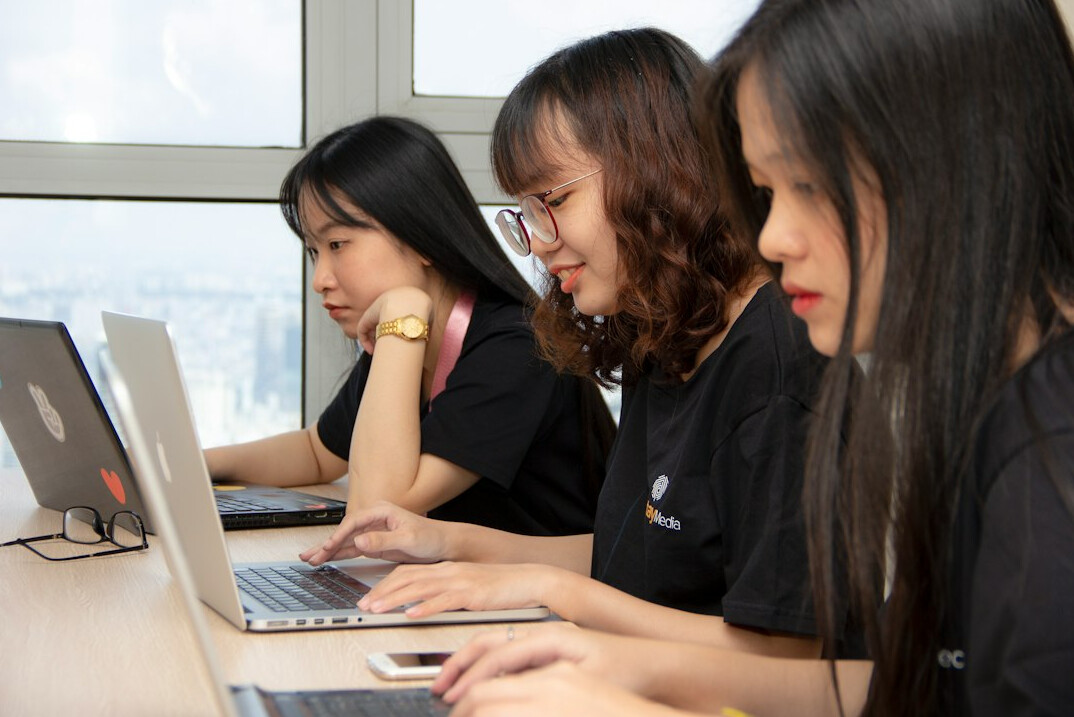 group of students learning programming